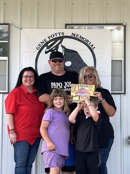 4Th Annual Gene Potts Memorial Steak Cookoff Results 22 Raymond Patterson handing the Golden Ticket to Angela Owens Malone
